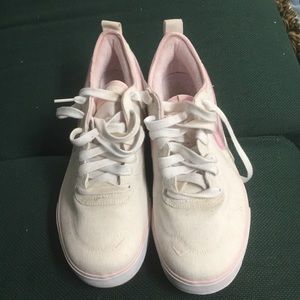 White and pink canvas Nike sneakers